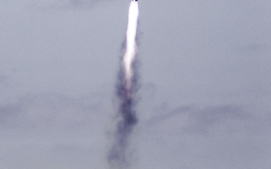A Japanese launcher system fires an SSM-12 missile toward a ship 60 miles off of Barking Sands Pacific Missile Range, Hawaii, on Thursday, July 12, 2018.