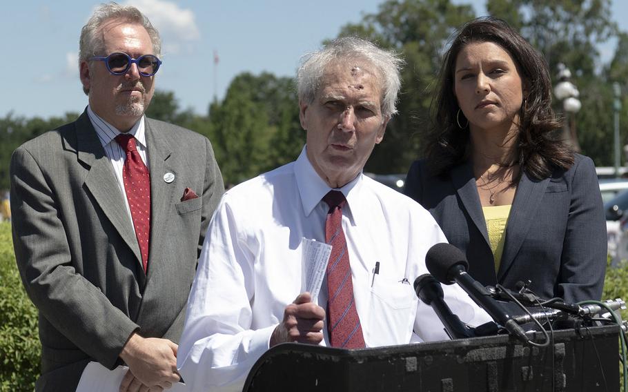 Rep. Walter Jones, R-N.C., speaks at a Capitol Hill press conference on a resolution he has introduced to limit presidential war powers, July 18, 2018. Among those speaking in favor of the resolution were co-sponsor Rep. Tulsi Gabbard, D-Hawaii, right, and Paul Kawika Martin of Peace Action, left.