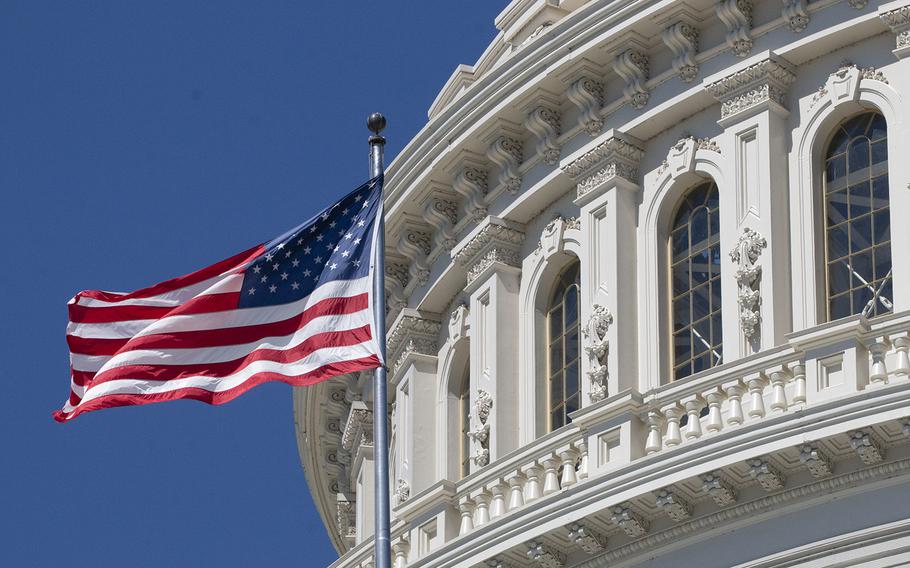 The flag flies over the U.S. Capitol on July 18, 2018.