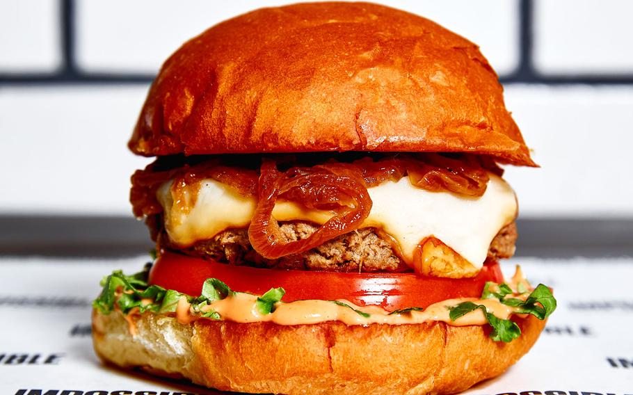 Wahlburgers — the fast-casual restaurant founded by executive chef Paul Wahlberg and brothers Mark and Donnie Wahlberg — will open its first location on a military installation at Joint Base Lewis-McChord in 2020. Seen here is the Impossible Burger.