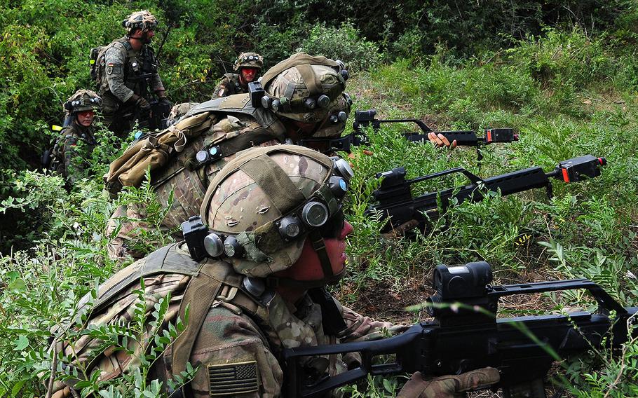 German and U.S. soldiers prepare an assault during a Military Operations On Urban Terrain training exercise as part of Noble Partner 2018 at Vaziani Training Area, Georgia, Aug. 4, 2018. 
