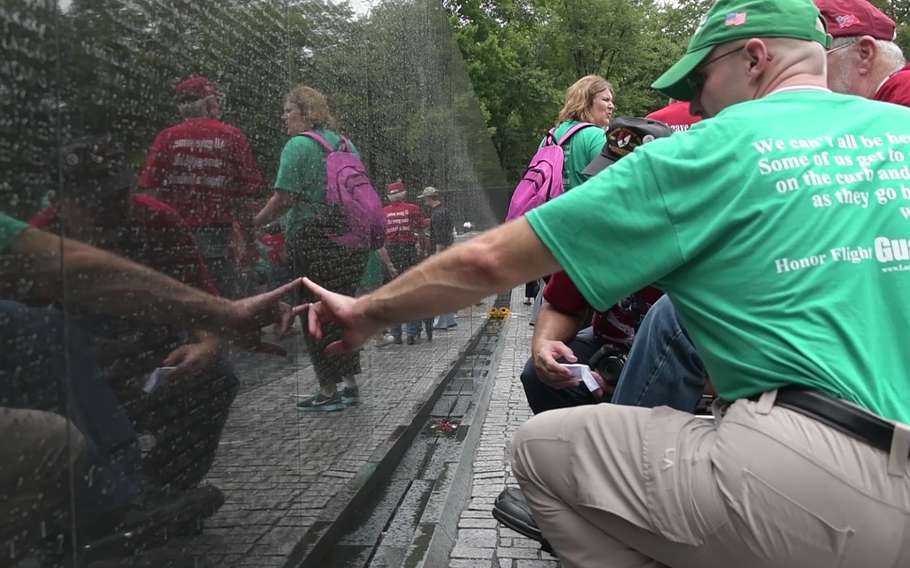 The Land of Lincoln Honor Flight from southern and central Illinois toured through Washington, D.C. on Tuesday, Aug. 21, 2018. The rain that drove away other visitors to the nation's capital had little effect on their desire to visit the monuments erected in their names.