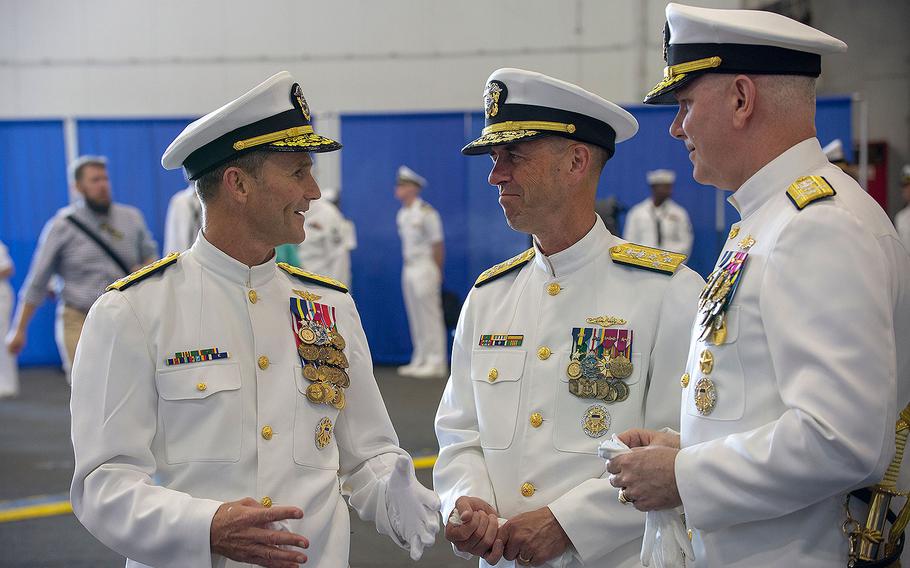 Commander, U.S. 2nd Fleet Vice Adm. Andrew “Woody” Lewis talks with Chief of Naval Operations Adm. John Richardson and Commander, U.S. Fleet Forces Adm. Chris Grady, following the 2nd Fleet Establishment Ceremony aboard the nuclear aircraft carrier USS George H.W. Bush at Naval Station Norfolk on Aug. 24, 2018 in Virginia. 