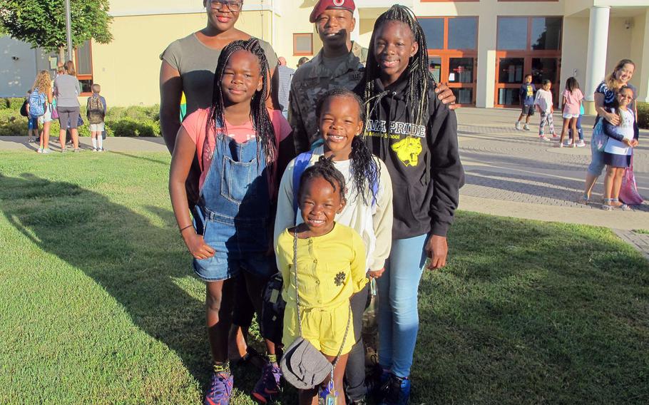  The Alvarez family poses in front of Vicenza Elementary on the first day of school. The family arrived recently from Washington state. ''It's off to a great start,'' said Kaitlyn, 9.
                ''I'm nervous,'' said Nysa, 11. Also pictured are Madisyn, 6, Lauryn, 4 and parents Mercy and Mario.
                