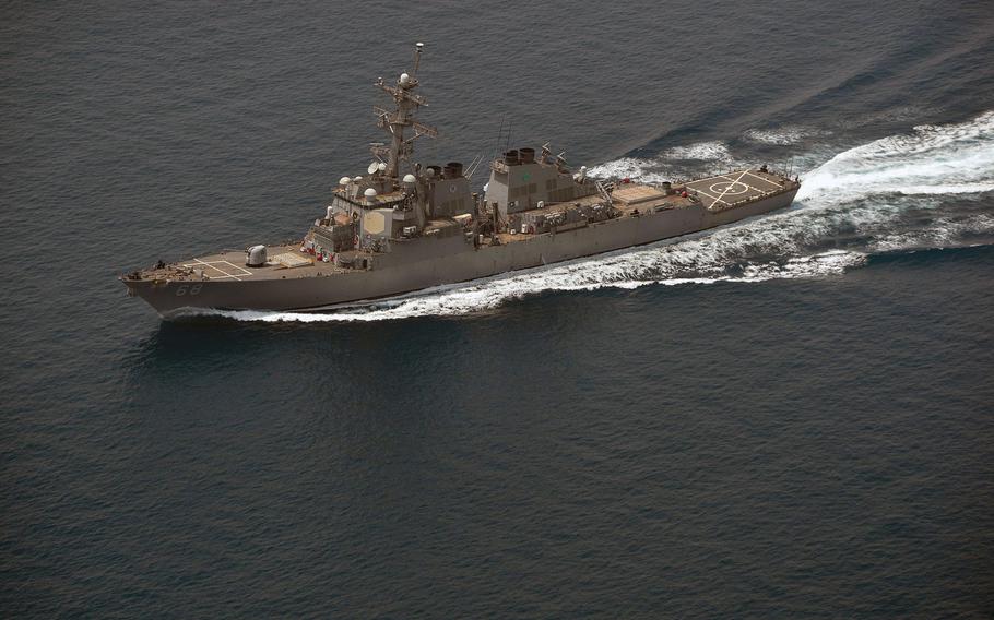 The guided-missile destroyer USS The Sullivans conducts a routine transit through the Strait of Hormuz, July 15, 2018. The U.S. said it will continue to maneuver in the Persian Gulf, rejecting a claim by a top Iranian general that his ships were in full control of the strategic waterway and that American warships have no place in the region.
                