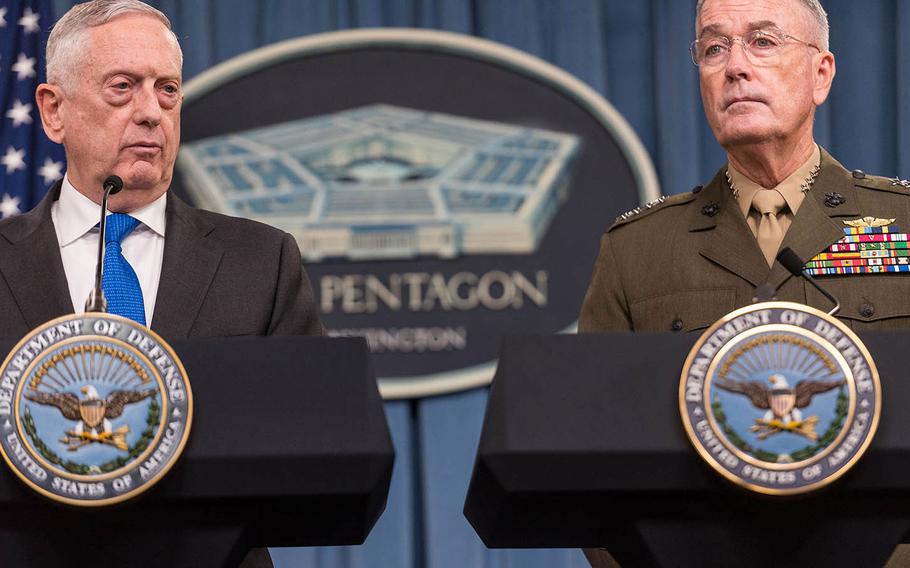 Defense Secretary Jim Mattis and Marine Gen. Joseph Dunford, the chairman of the Joint Chiefs of Staff, speak during a press conference Tuesday, Aug. 28, 2018 at the Pentagon. 