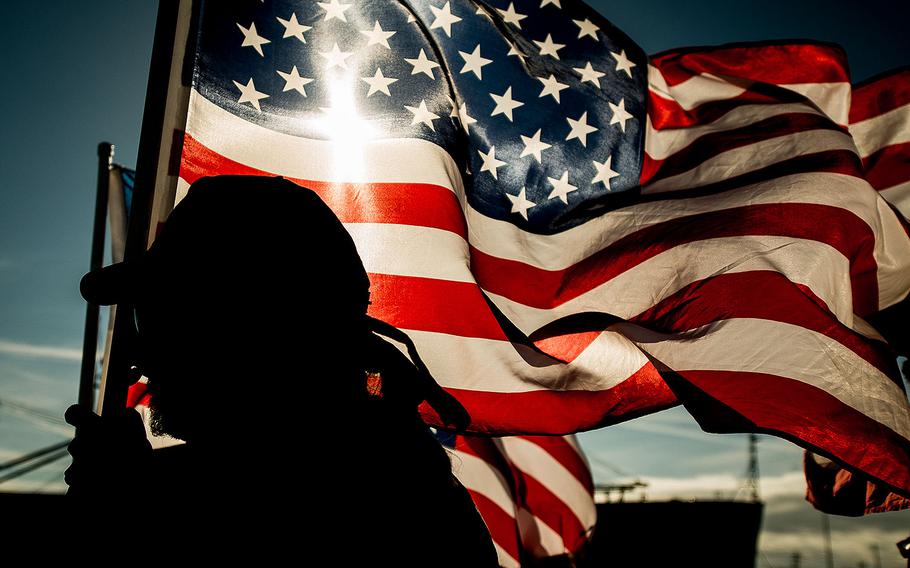A South Carolina Patriot Guard member lines up along a Charleston, S.C. pier on Dec. 11, 2013.