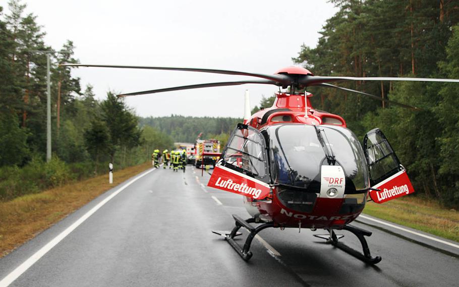 A helicopter sits on the B299 between Huetten and Kaltenbrunn near Grafenwoehr, Germany, following an accident involving two U.S. servicemembers on Sept. 1, 2018.