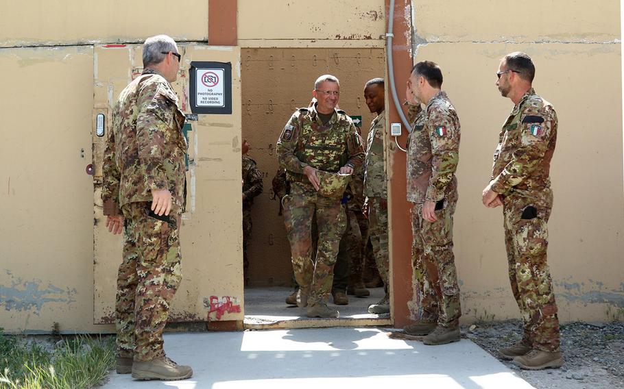 Italian Maj. Gen. Antonio Bettelli is the first person to process through and leave from the new passenger terminal at Resolute Support headquarters in Kabul, Afghanistan, June 3, 2018.