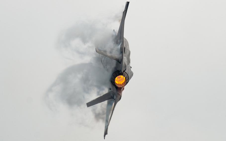 In an August 18, 2018 file photo, Capt. Andrew Olson, F-35 Heritage Flight Team commander and pilot, pulls a tactical pitch in an F-35A Lightning II during the Chicago Air and Water Show in Chicago.