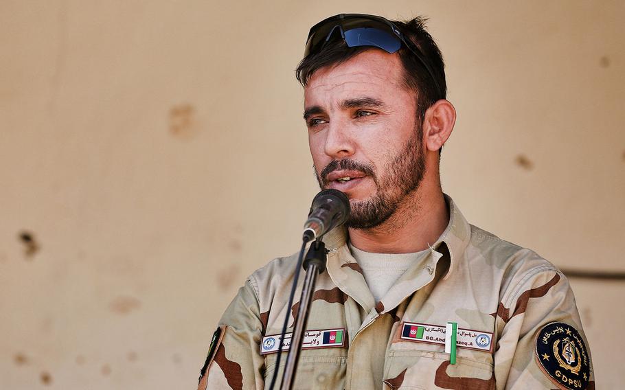 Gen. Abdul Raziq, Kandahar police chief, speaks to locals during a shura on Oct. 22, 2013.