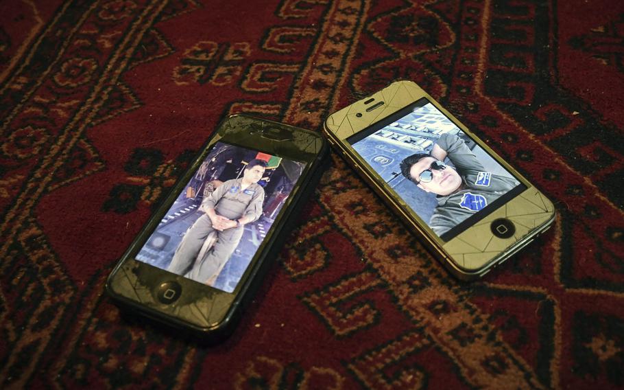 The family of Afghan flight engineer Mahboobulhaq Safi, 30, keep photos of their loved one, who was one of the most highly trained airmen in the Afghan air force and was assassinated on Aug. 27, 2018. The family wants more protection for airmen, who face threats both at work and off duty.