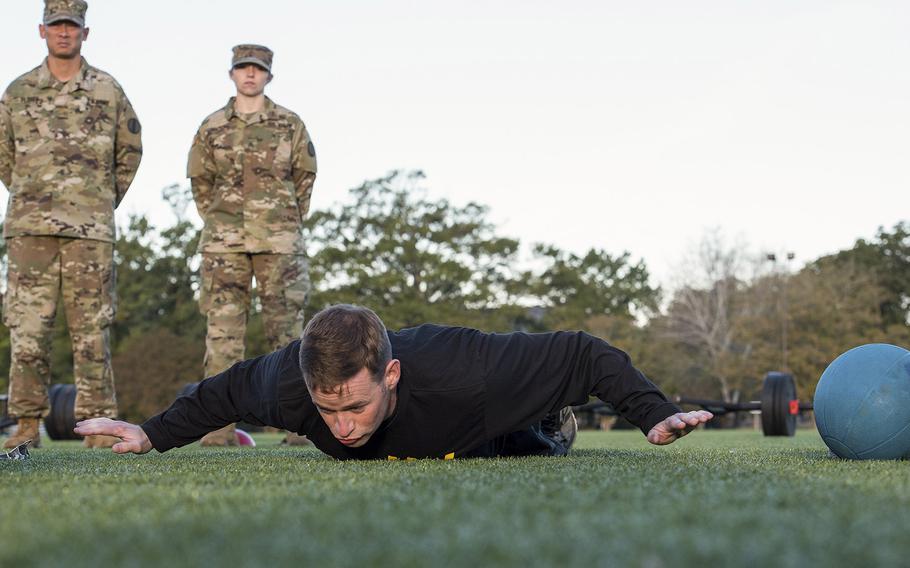 A soldier with the 128th Aviation Brigade at Fort Eustis, Va., demonstrates the army extension version of the hand release pushup on Tuesday, Oct. 23, 2018.