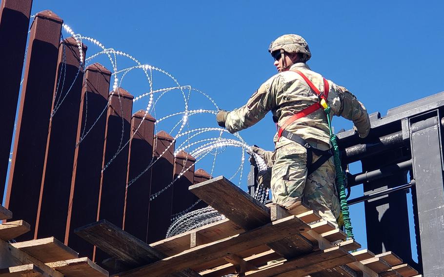 Soldiers from the 41st Clearance Company, 4th Engineer Battalion, 36th Engineer Brigade, Task Force Griffin, begin the process of hanging concertina wire as a deterrent along the southwest border, Nov. 16, 2018.
