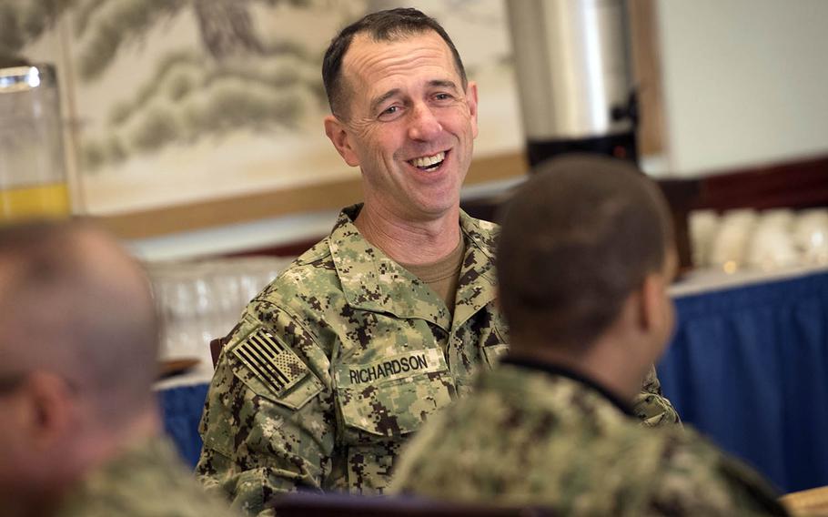 Chief of Naval Operations Adm. John Richardson eats breakfast with sailors at Yokosuka Naval Base, Japan, Thursday, Jan. 17, 2019.