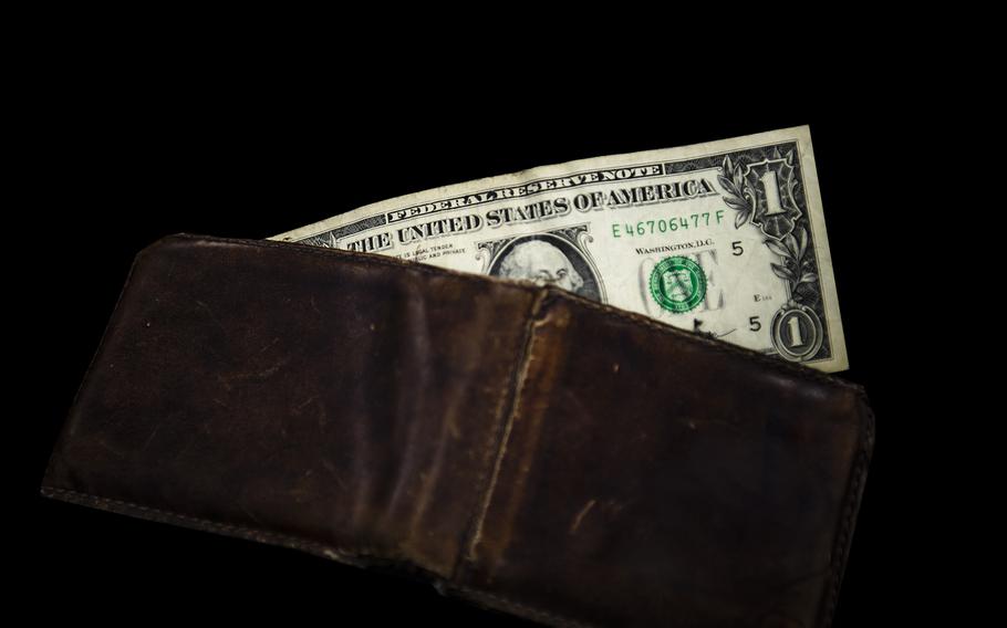 A man accused of misleading veterans to turn over much of their military retirement or disability benefits has been fined $1 after agreeing to cooperate in an ongoing investigation.