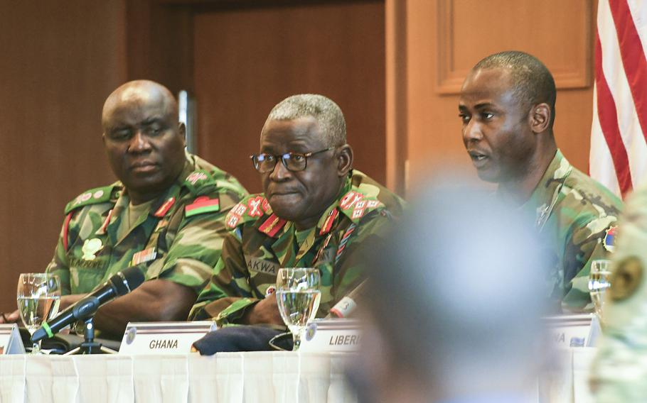 Malawi's Gen. Vincent Thom Nundew, left, and Ghana's Lt. Gen. Obed Boamah Akwa, center, look on as Liberia's Maj. Gen. Prince Charles Johnson III, right, speaks during a panel discussion on the importance of empowering noncommissioned officers at a conference U.S. Africa Command hosted for African senior enlisted leaders at the Edelweiss Lodge and Resort in Garmisch-Partenkirchen, Germany, on Tuesday, August 13, 2019.
