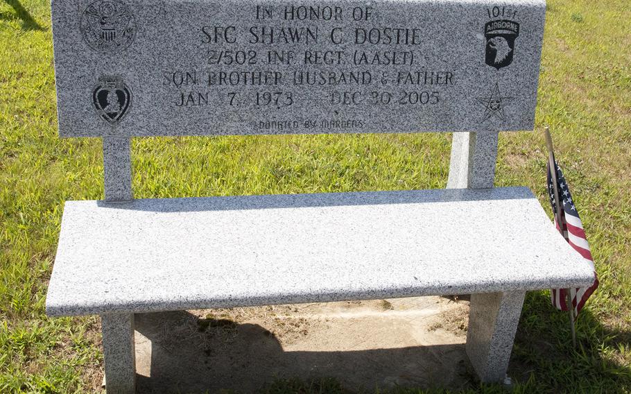 A granite bench at the Veterans Memorial Park in Lewiston, Maine, honors Sgt. 1st Class Shawn Dostie, who was killed in Iraq in December, 2005.