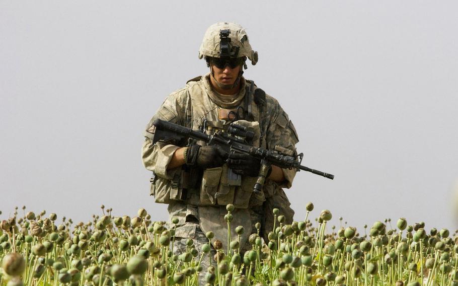 Staff Sgt. Calvin Gibbs in Afghanistan's Kandahar province, in a 2010 photo.