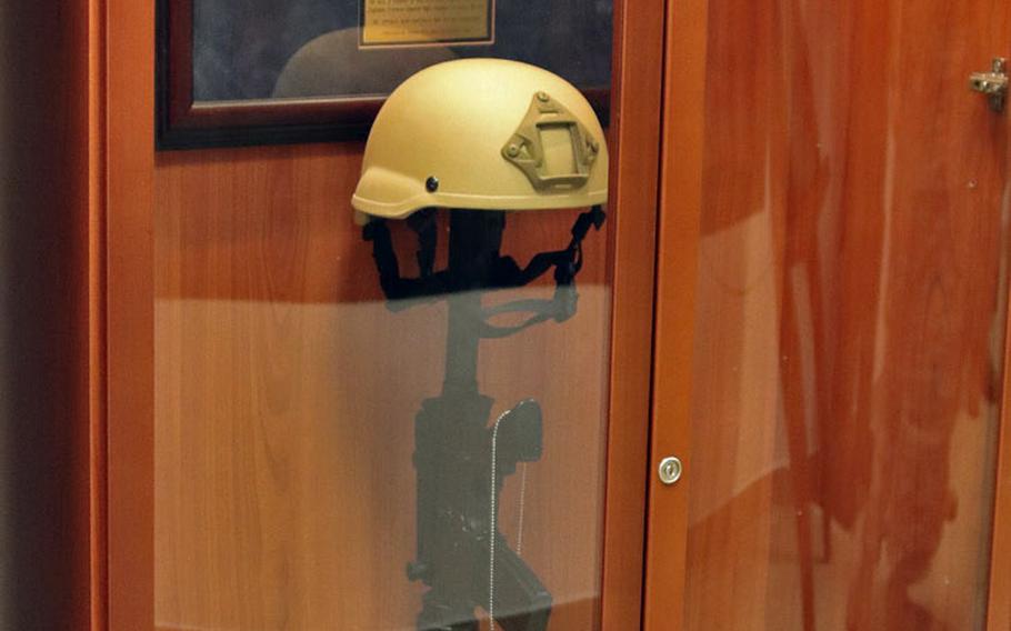 A display inside the Airman Leadership School at Aviano Air Base, Italy, memorializes Tech. Sgt. Adam K. Ginett who was killed in Afghanistan in January 2010. The Airmanship Leadership School was renamed in honor of Ginett on February 13, 2020.