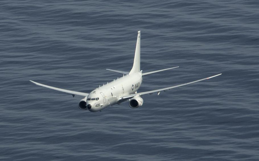 A P-8A Poseidon maritime patrol and reconnaissance aircraft flies over the Atlantic Ocean, March 29, 2020. A Russian fighter jet's intercept of a P-8A over the Mediterranean Sea on Wednesday risked a collision, the U.S. Navy said.