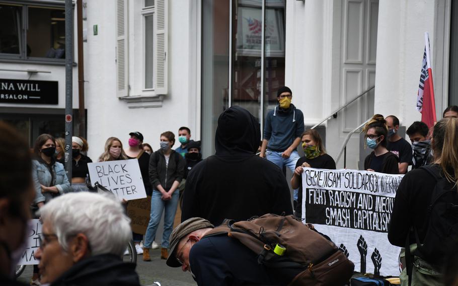 Demonstrators are pictured here during a rally in downtown Kaiserslautern to oppose racism on Thursday, June 4, 2020, as a sign of solidarity with American protests in several cities spurred by police brutality.