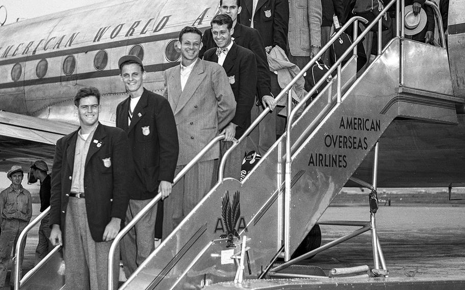 Members of the 1948 U.S. Olympic team who competed in the London games arrive in Frankfurt from Prague to take part in an exhibition meet in August, 1948.