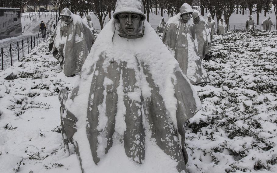 Snow covering the statues at the Korean War Veterans Memorial in Washington, D.C., during a February, 2015 storm serves as a reminder of the hardships endured by troops who fought in the conflict.
