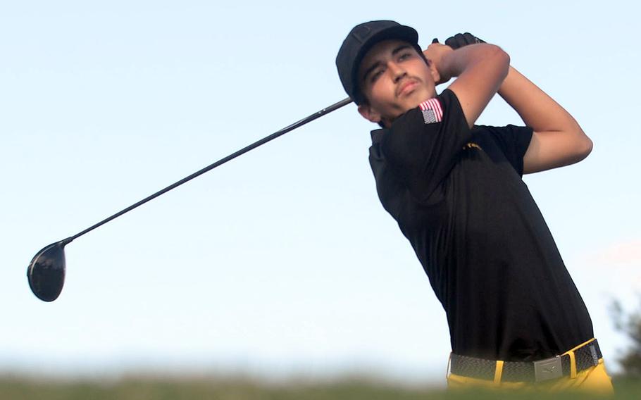 Kadena senior Beau Black, the Okinawa boys district champion, tees off on the 350-yard, par-4 17th hole.
