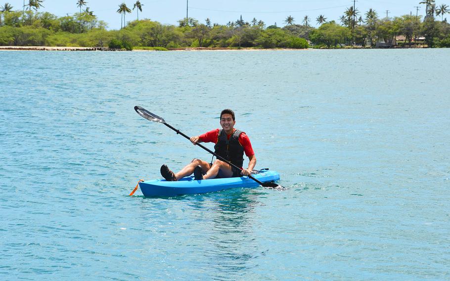 Jonah Lee kayaks toward Joint Base Pearl Harbor-Hickam, Hawaii, on his way to high school track practice, April 23, 2021.