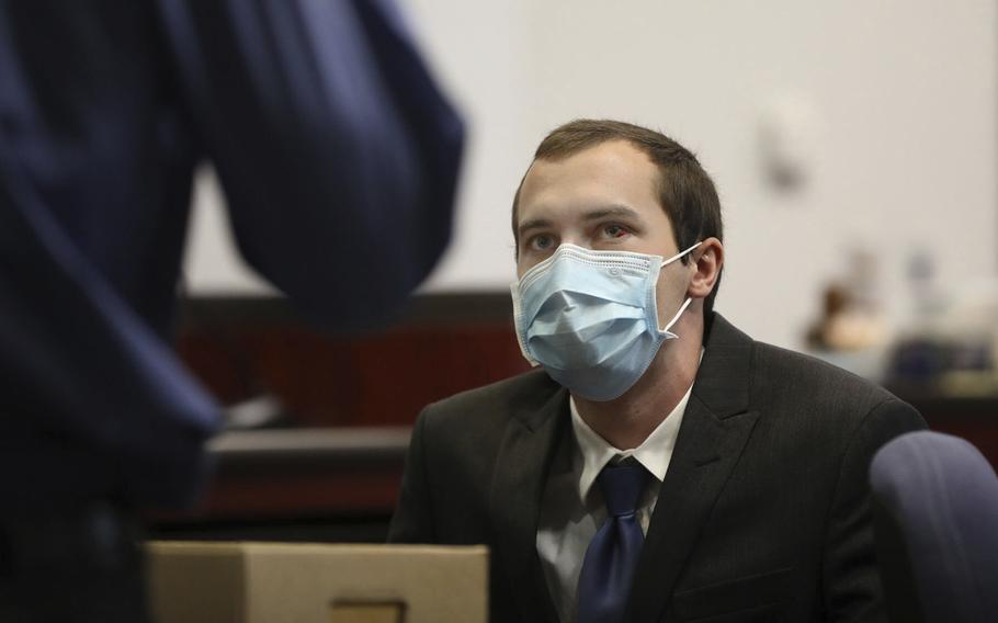 Mark Gooch, 22, awaits opening statements in his trial at the Coconino County Superior Court in Flagstaff, Ariz., on Friday, Sept. 24, 2021. Gooch is charged with first-degree murder in the death of Sasha Krause, 27, in early 2020. 