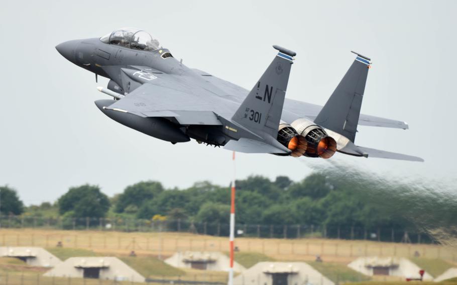 An F-15E Strike Eagle assigned to the 492nd Fighter Squadron takes off from RAF Lakenheath, England, during a large-force exercise with other U.S. Air Forces in Europe-Air Forces Africa units, May 27, 2020.
                