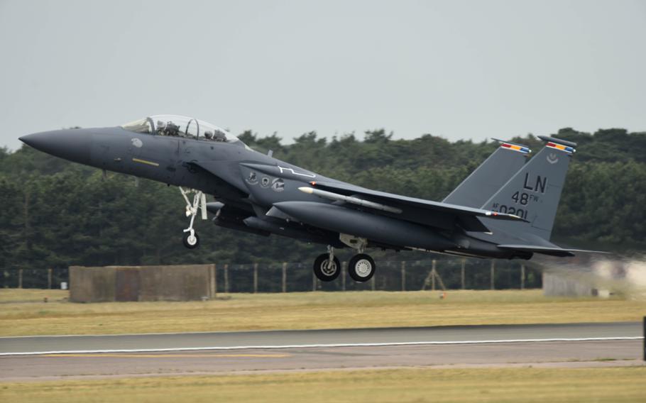A 48th Fighter Wing F-15E Strike Eagle takes off from RAF Lakenheath, England, May 27, 2020. U.S. Air Force F-15s assigned to 48th Fighter Wing, F-16s assigned to the 31st Fighter Wing and 52nd Fighter Wing, and KC-135s tankers assigned to the 100th Air Refueling Wing participated in a large-force exercise within the U.K.'s North Sea airspace. 
                