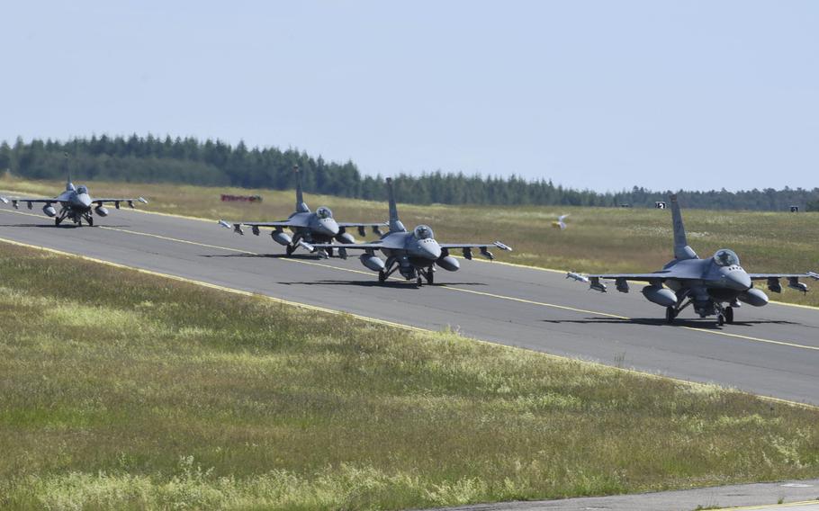 U.S. Air Force F-16 Fighting Falcons, assigned to the 480th Fighter Squadron, taxi at Spangdahlem Air Base, Germany. Aircraft from the squadron participated in a large-force exercise within the United Kingdom's North Sea airspace, May 27, 2020. 
                