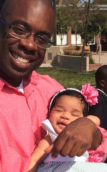 Walt Daniel holds his baby daughter Victoria just months after her mother, Navy Lt. Rebekah Daniel died in childbirth at Naval Hospital Bremerton in March 2014.