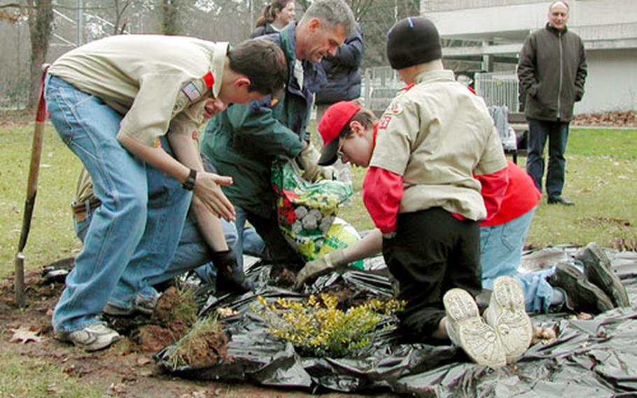 Troop 26 Boy Scouts help Christopher Guyer with his Eagle Scout project this week at the Europaische School in Karslruhe.