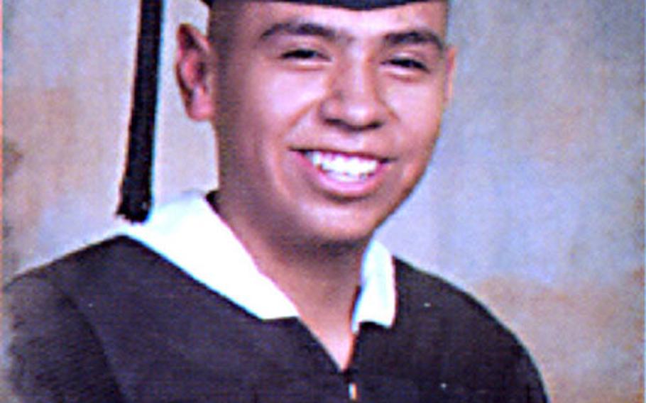 Clint Lamebear's graduation photo from Gallup High School, N.M.