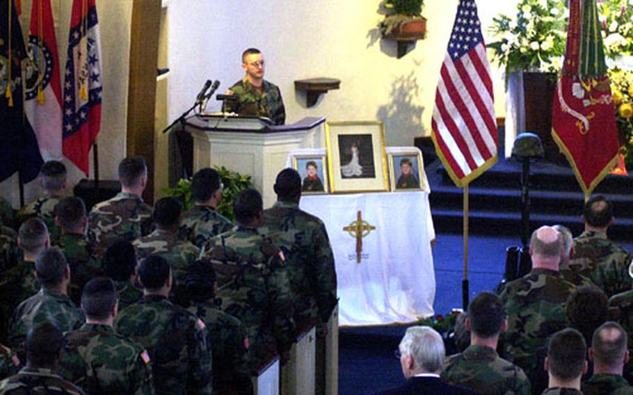 In this photo from November 2000, the Leighton Barracks chapel in Würzburg was full for the memorial ceremony for the Goodridge family. Maj. Michael Goodridge, his wife, Jennifer, and their sons, Michael and Kyle, died in a cable-car tunnel fire in Austria on November 11.