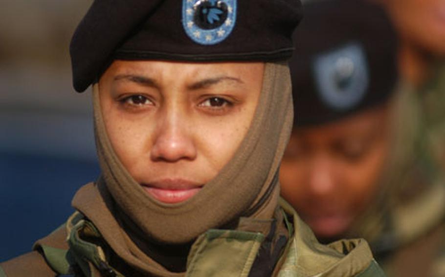 Pfc. Victoria Thompson, Headquarters and Headquarters Company, Camp Red Cloud, South Korea, bundles up against the cold last week.