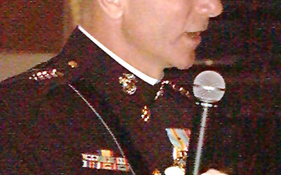 Gen. Michael Hagee, the 33rd Commandant of the U.S. Marine Corps, speaks at his Passage of Command ceremony Monday at Annapolis, Md.
