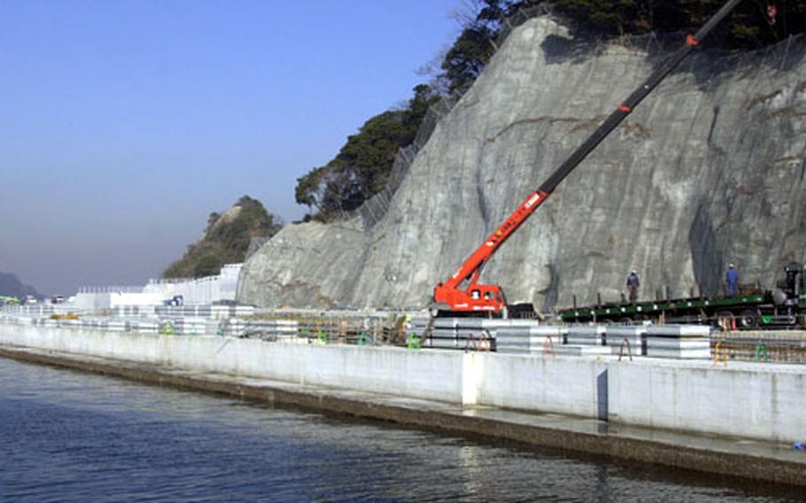 Construction on the Piedmont Pier, or Pier 12, is about to begin again after Yokosuka City officials approve an environmental plan for the project.