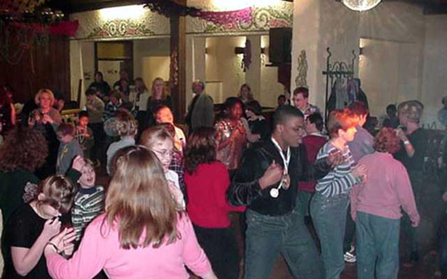 Student athletes "boogie down" Jan. 29, 2002 at disco night after last year's winter games for special educations students in Europe. Called the Department of Defense Dependents Schools Winter Challenge this year, the event offers students with special education needs an opportunity to practice social skills in the real world, school officials said.