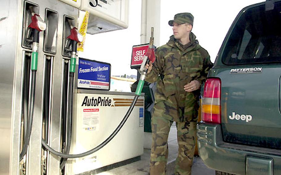Rising gas prices "might slow down the travel" around Germany in the family’s Jeep SUV, said Sgt. Scott Crum of Headquarters, Headquarters Co., 40th Engineering Battalion, as he gassed up Tuesday.