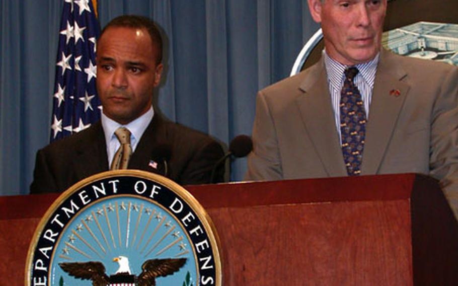 Ambassador Pierre-Richard Prosper, U.S. ambassador for war crime issues, left, and W. Hays Parks, special assistant to the Judge Advocate General for the Army, brief reporters Monday on U.S. plans to bring members of the Iraqi regime to trial for war crime violations. The regime appears to be in clear violation of war crimes for three acts committed thus far, Parks said. They are the filming and airing of interviews with U.S. prisoners of war for the sake of humiliation and propaganda, executing U.S. POWs, and Iraqi troops displaying white surrender flags in order to entrap U.S. warfighters.