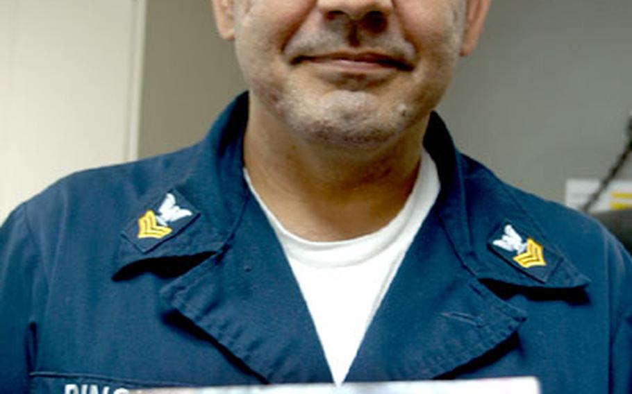 The captain of an Iraqi fishing vessel gave a signed dinar note to one of his escorts on the USS Gary, Petty Officer 1st Class Ricardo Pinolay, an operations specialist. The captain wrote “For Pinolay, friend.”