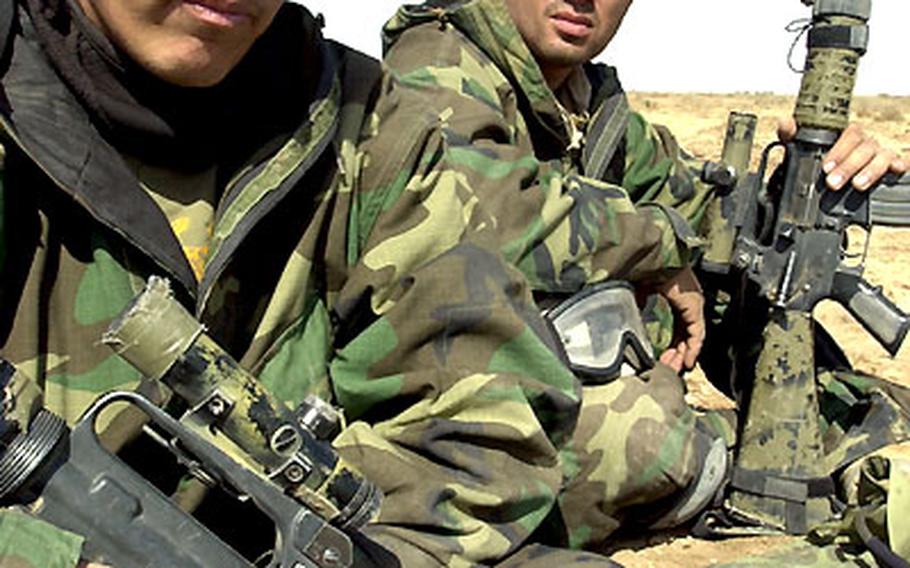 Marine Sgts. Christopher Merkle, left, and Jose Rodriguez — infantrymen with Company G, 2nd Battalion, 23rd Marines —ducked doctors, hitched rides, begged for gear and even thought about stealing a Humvee to return from a shock trauma center in Iraq to their unit after getting injured in a truck accident.