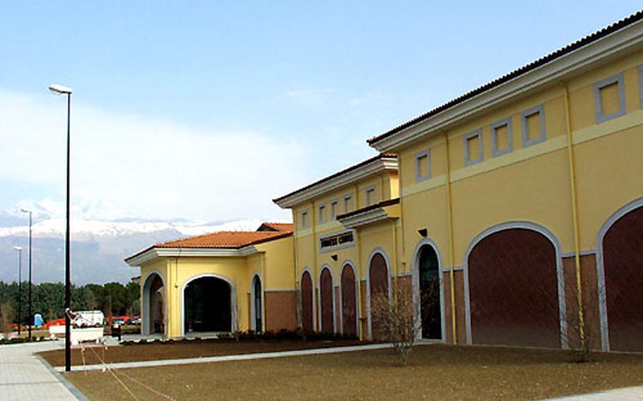 The Aviano fitness center, which opens Friday, is bordered on three sides by the golf course, softball fields and track. The other side features a view of the sun-coated mountains beyond the headquarters facility.