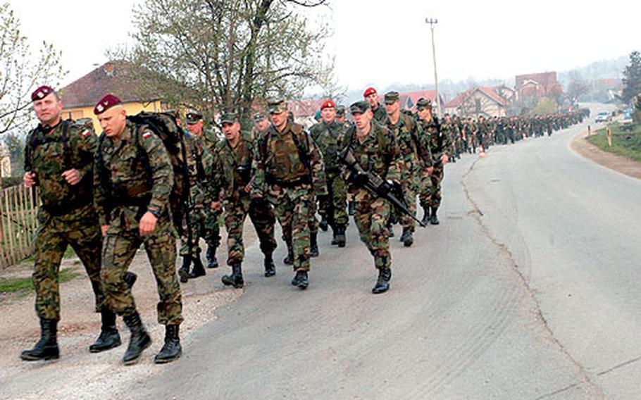 Almost 300 Stabilization Force troops set out on a 30-kilometer march Saturday morning.