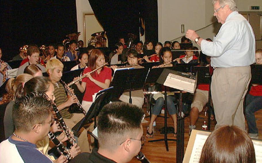 Far East Honor Music Band members practice a number they'll perform at a music festival Saturday at Kadena Air Base, Okinawa.