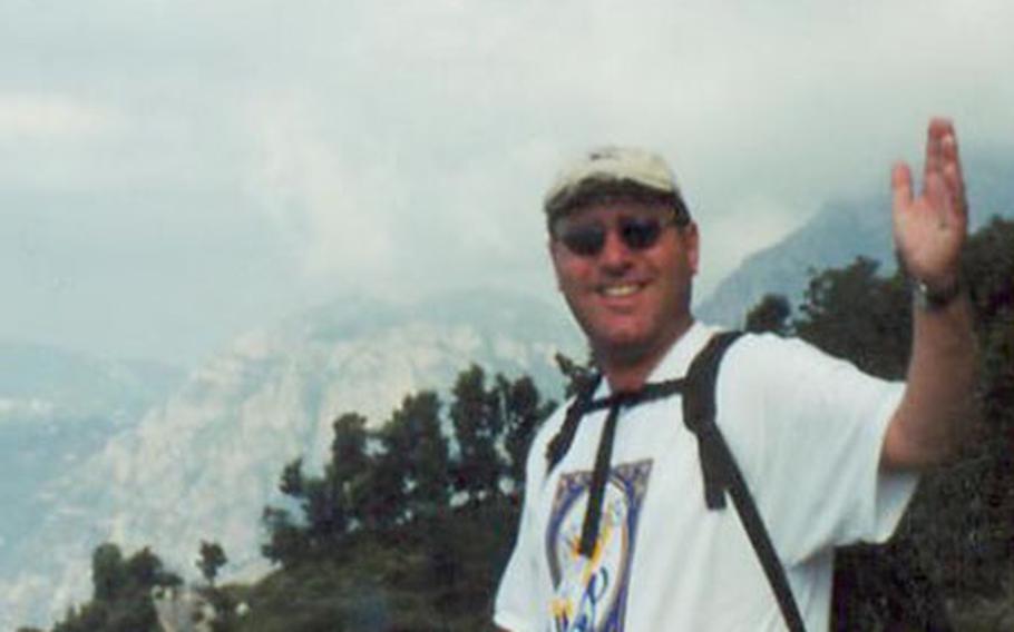 Paul E. Tralmer, who frequently led treks around the Naples, Italy, area, was killed April 16. Friends remembered him Thursday at a memorial service in Naples, Italy.